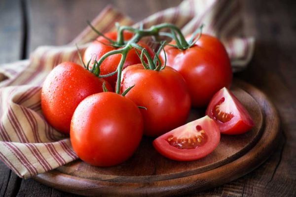 soñar con tomates maduros